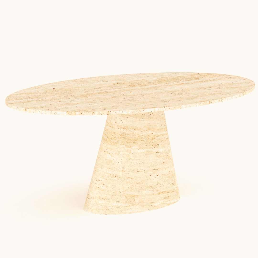 The Olympian Ellipse Travertine Table by Travertable features a beige, oval top with a ribbed pedestal base and a smooth, polished finish, enhancing its minimalist modern design against a light background.