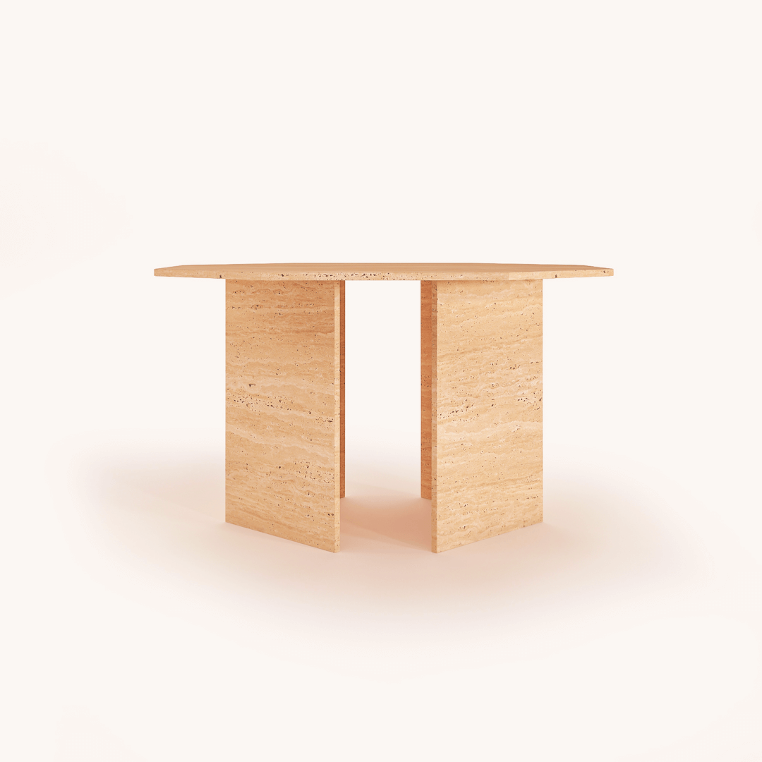 The Harmony Travertine Dining Table by Travertable is a modern piece with a rectangular top and two flat, vertical supports forming a unique base. Made from light-colored wood, its sleek design is enhanced by a neutral backdrop.