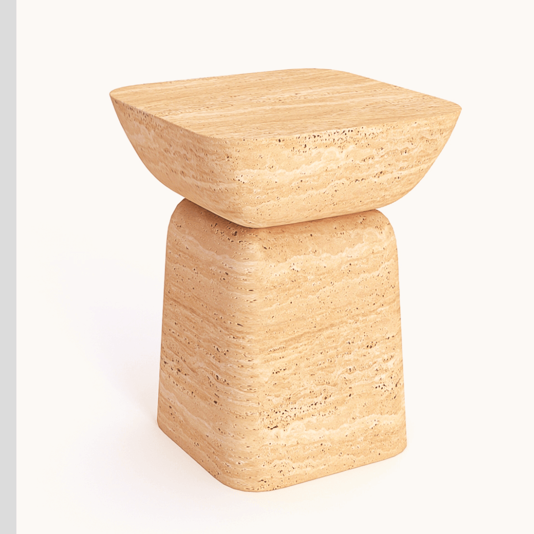 The Travertable Modern Minimalist Travertine Side Table is a small square stool in tan marble, featuring a polished finish with a wider top that tapers to a narrower base and showcases a natural stone pattern.