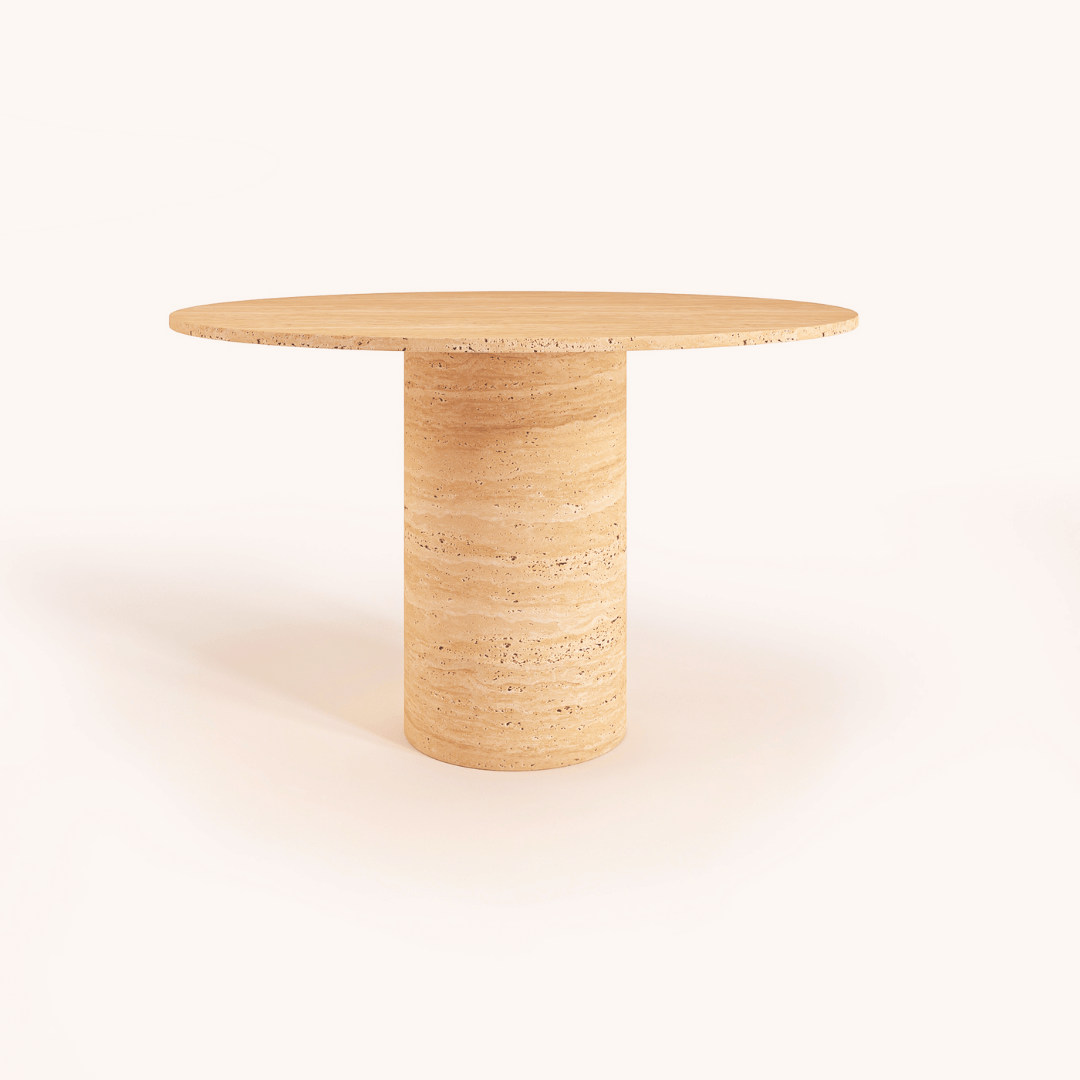 The Elysian Travertine Round Dining Table by Travertable boasts a light brown wood cylindrical base set against a plain white backdrop, providing a customizable element to fit your style.