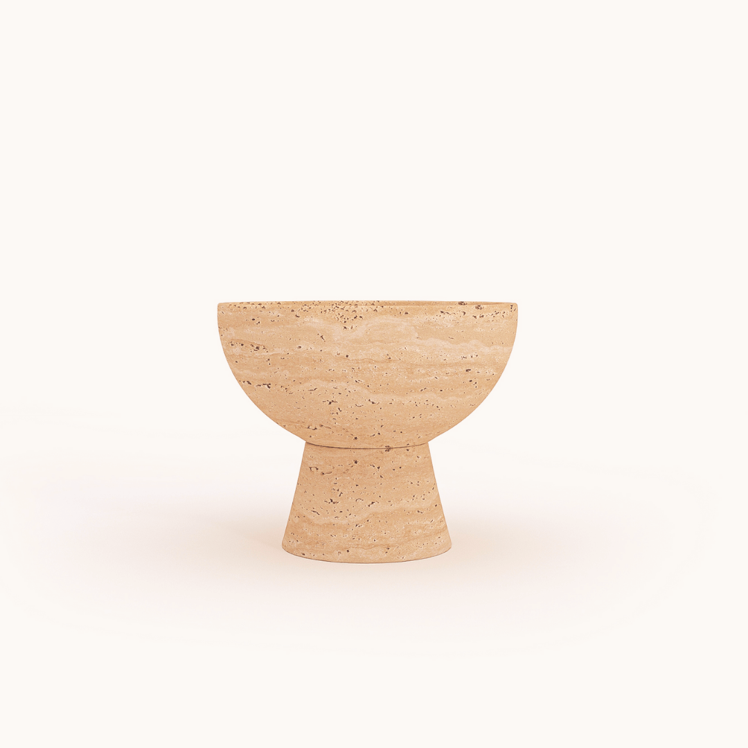 The Travertable Sleek Modern Travertine Marble Bowl features a beige, textured stone design with a wide, round top and a narrow, conical base against a plain white background.