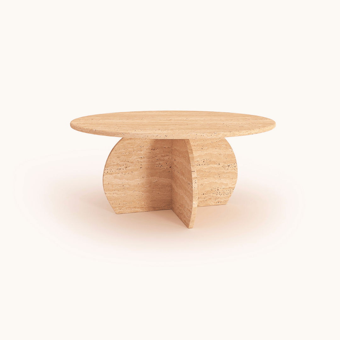 The Stone Essence Travertine Coffee Table by Travertable features a monolithic modern design with a minimalist aesthetic, enhancing natural beauty and complementing minimalist decor against an off-white background.