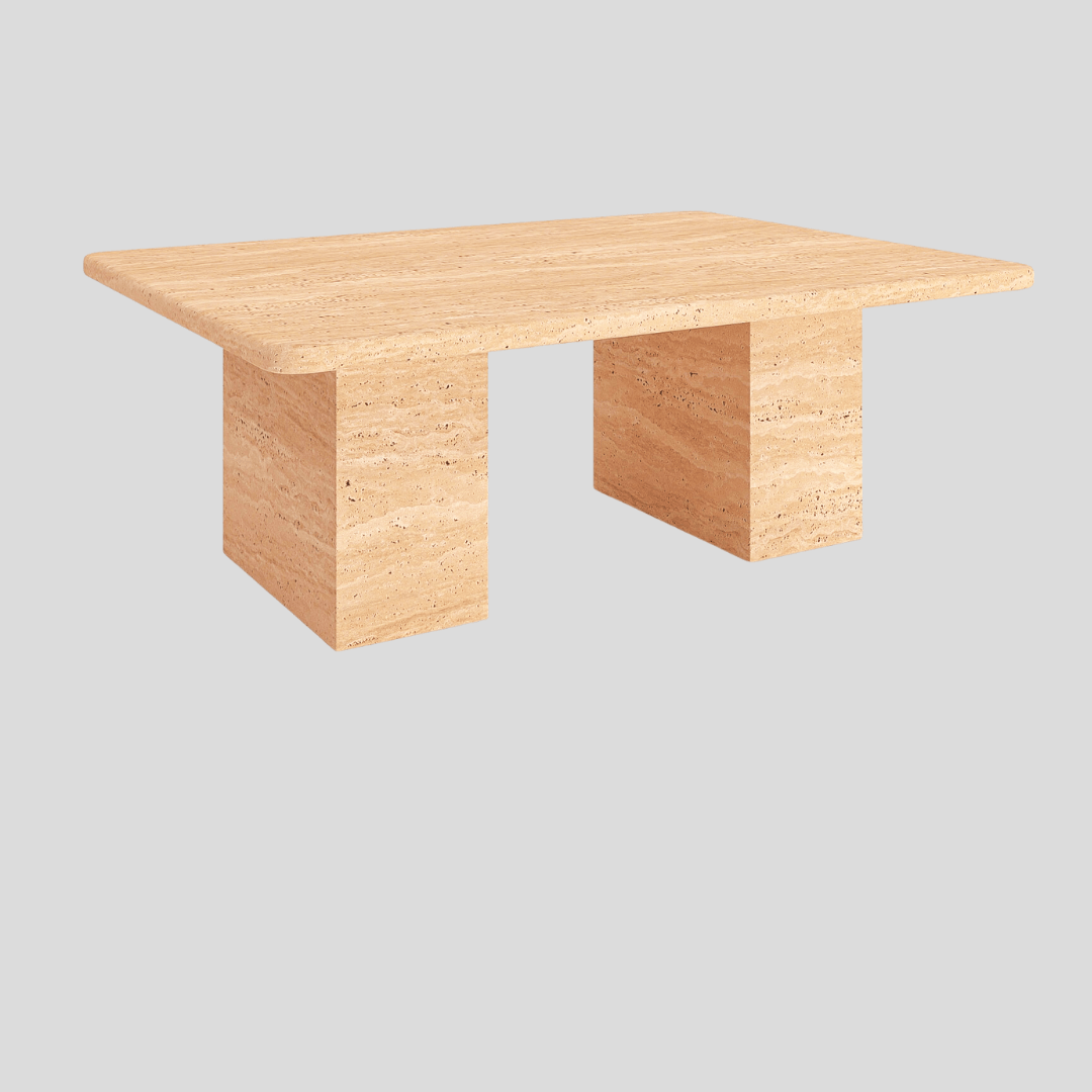 The Limestone Luxury Coffee Table by Travertable is a modern minimalist piece crafted from natural stone, featuring a smooth, elegant finish and sculptural design. Its timeless look stands beautifully against a light gray background.