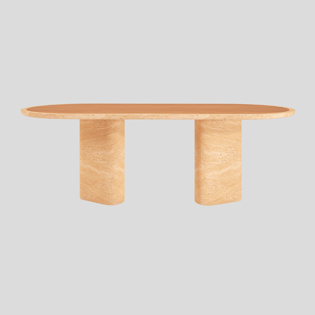 The Harmony Travertine and Walnut Dining Table by Travertable is a contemporary oval-shaped beige travertine table with two rectangular pedestal legs, customizable in design, featured against a plain gray background.