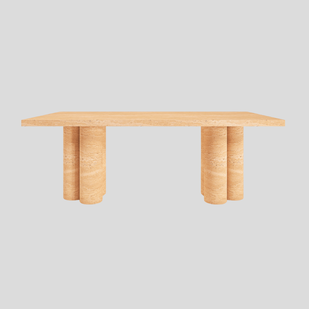 The Meridian Travertine Dining Table by Travertable features a rectangular wooden top with two cylindrical solid legs, exuding natural elegance. Its modern design stands out beautifully against a plain gray background.