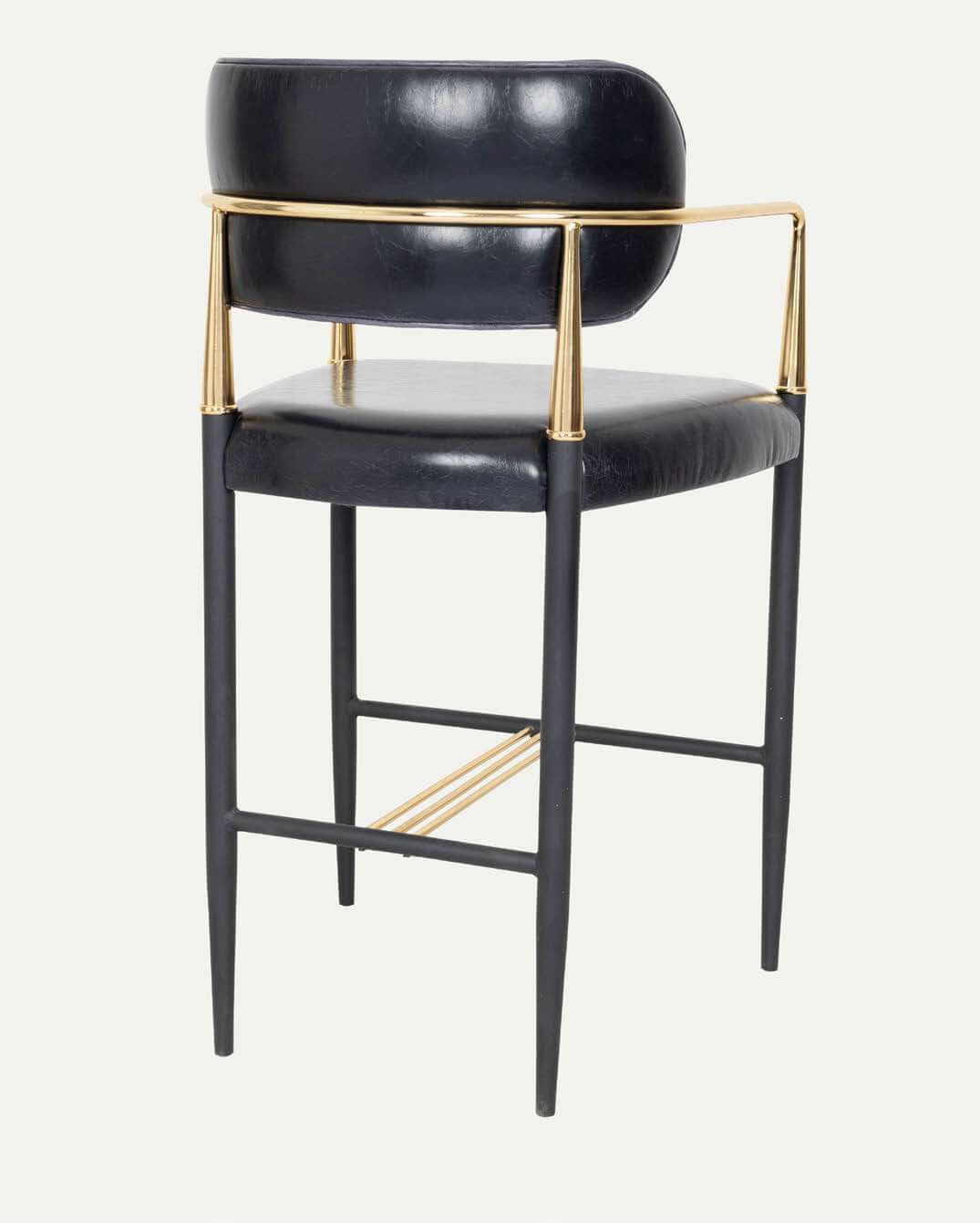 Lux Royale Bar Stool Indulge in the epitome of luxury and elegance with the Lux Royale Bar Stool. This sophisticated stool is crafted with a striking combination of black leather and gleaming gold accents, designed to bring a touch of opulence to any bar