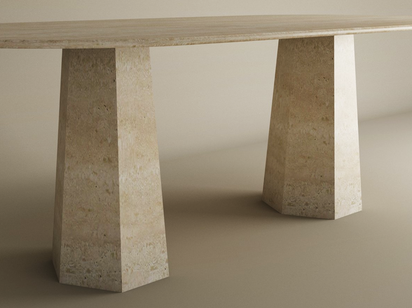 The TRAVERTABLE Oval Travertine Dining Table features a smooth solid stone oval top and tapered round base, blending minimalist style with customizable options, perfect for dining spaces with a neutral beige background.