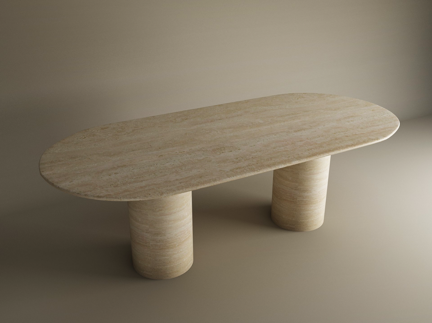 The TRAVERTABLE Oval Travertine Dining Table features a smooth, pure travertine tabletop and two cylinder bases—an heirloom-quality, customizable piece ideal for sophisticated spaces.