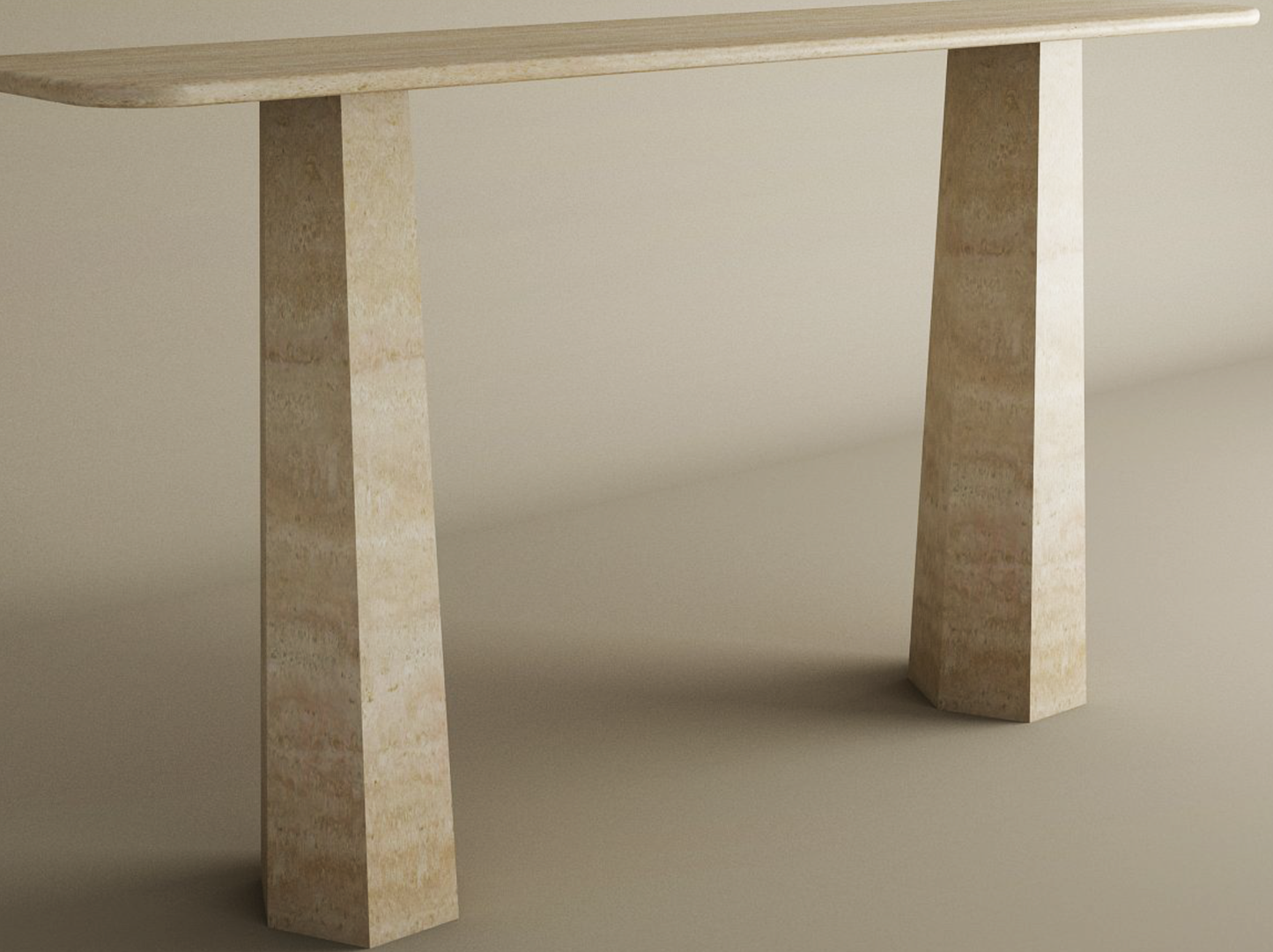 The TRAVERTABLE Rectangular Travertine Console Table features a solid travertine stone top and a tapered round base, shown against a plain light background. This customizable console table adds timeless elegance to any space.