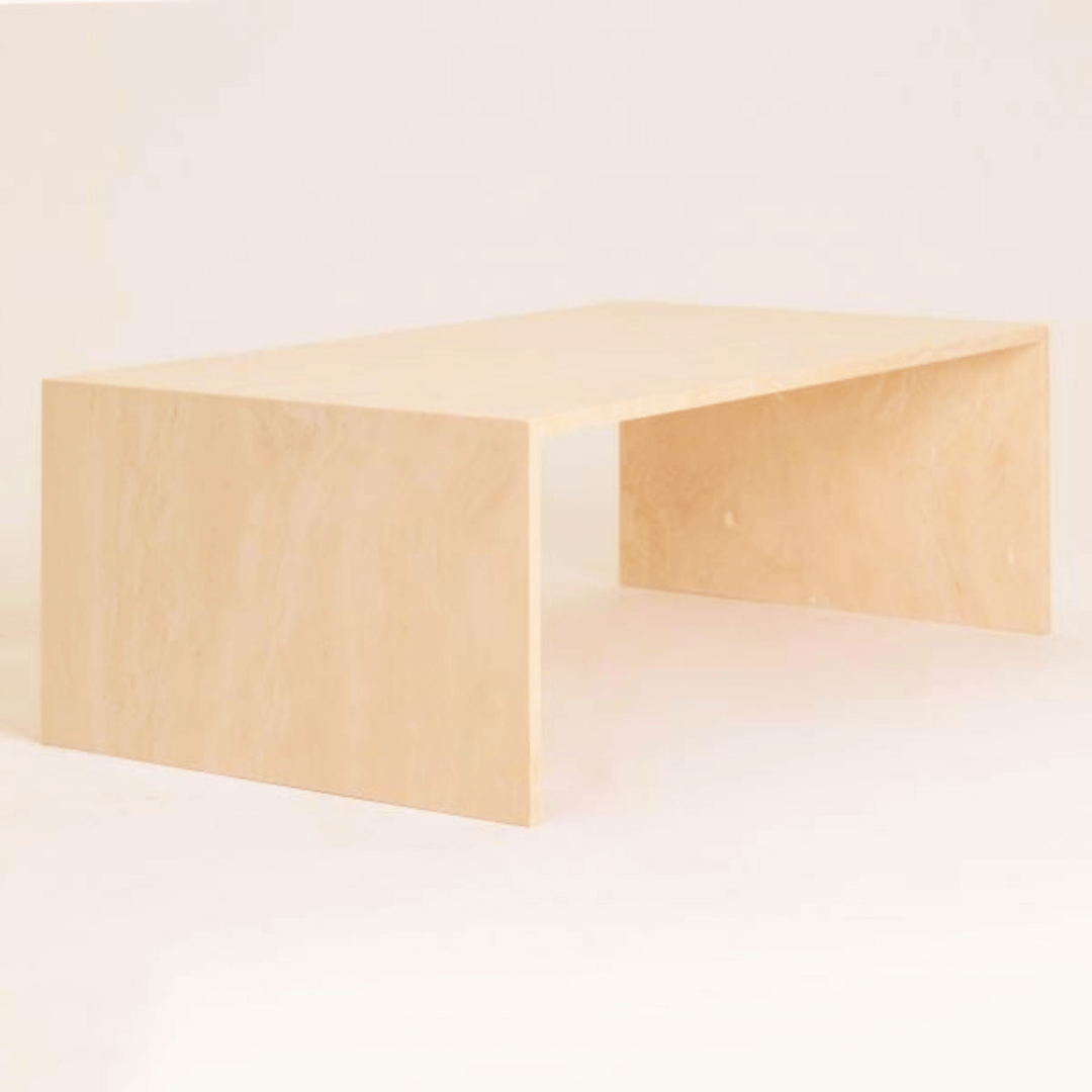 Customizable travertine coffee table displayed in a modern living room setting