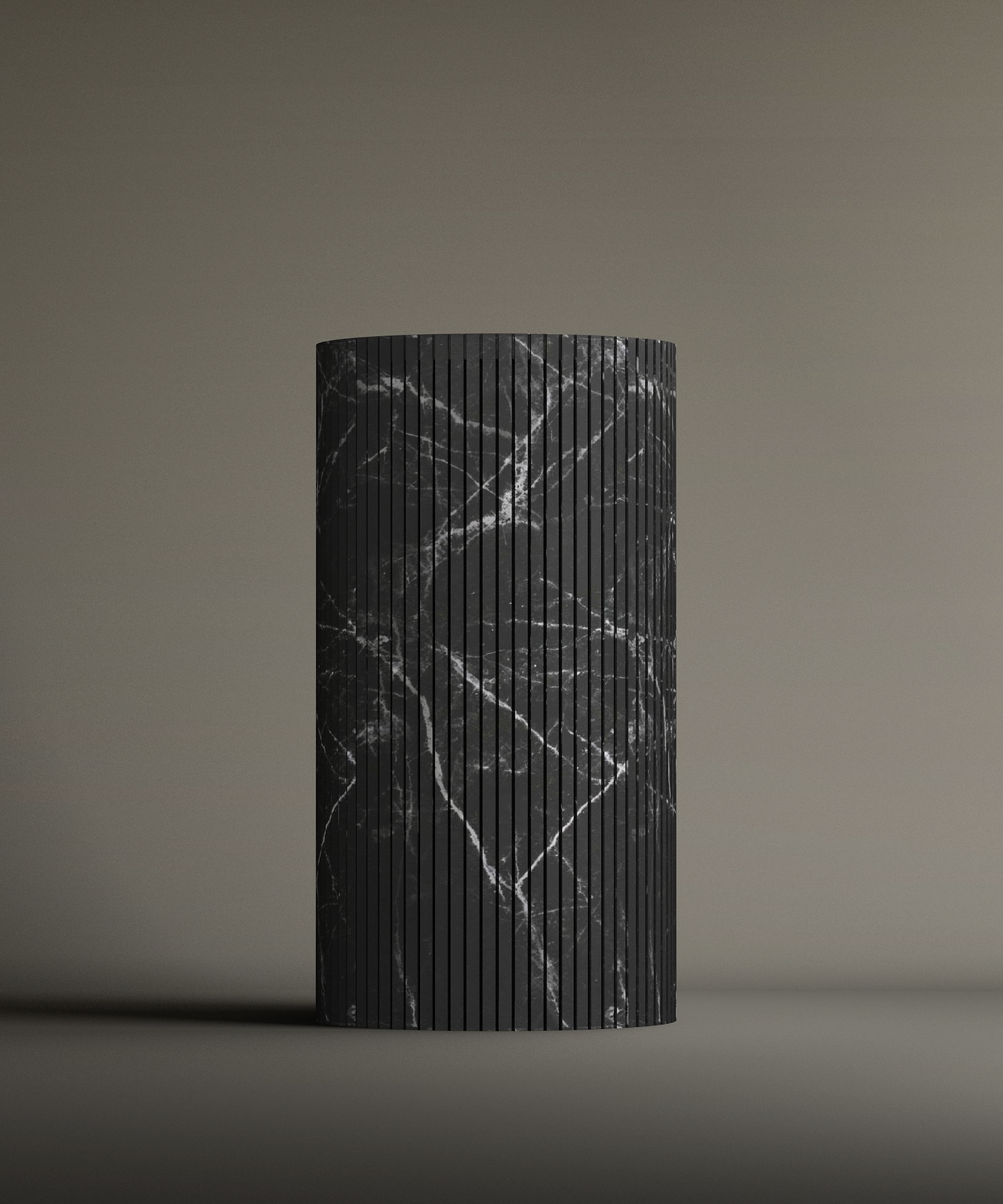 The TRAVERTABLE Nero Marquina Round Fluted Marble Pedestal Vanity Sink features a tall, cylindrical shape with white-veined black marble and fluted grooves, elegantly displayed on a plain gradient background.