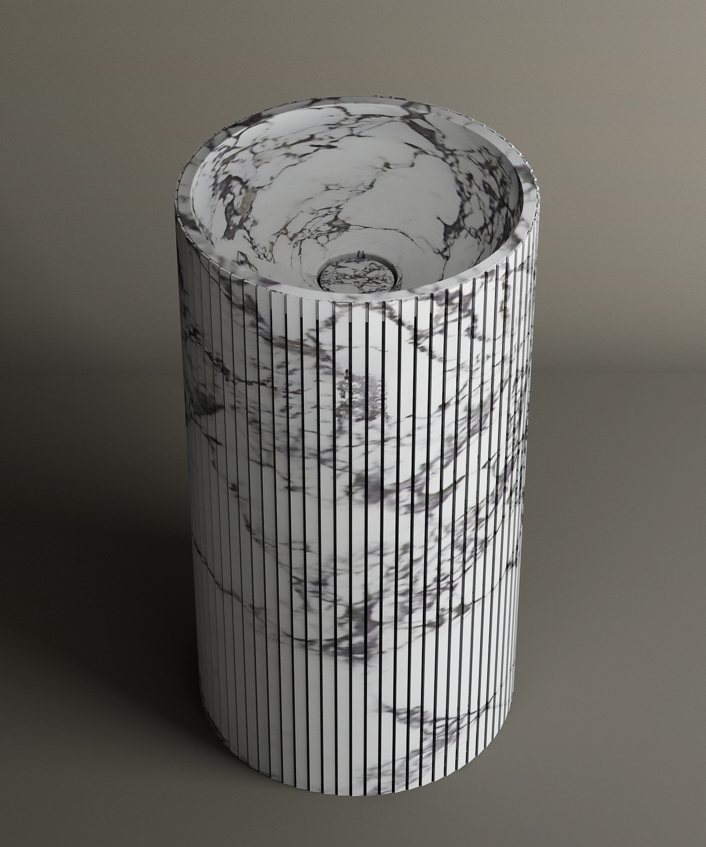 The TRAVERTABLE Calacatta Round Fluted Marble Pedestal Vanity Sink features dramatic gray veining and vertical black lines, displayed on a neutral surface for a modern, minimalist look.