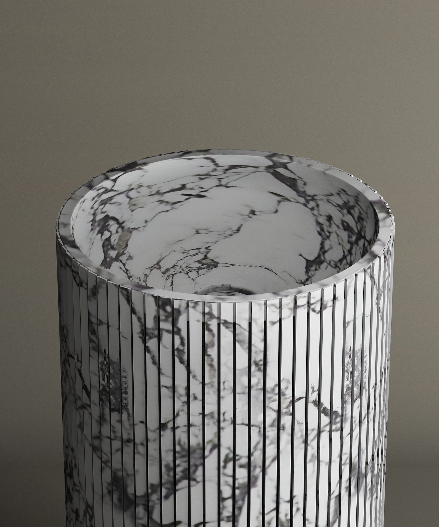The TRAVERTABLE Calacatta Round Fluted Marble Pedestal Vanity Sink features gray veining and a fluted cylindrical exterior, standing out against a taupe backdrop with its consistent modern marble design.