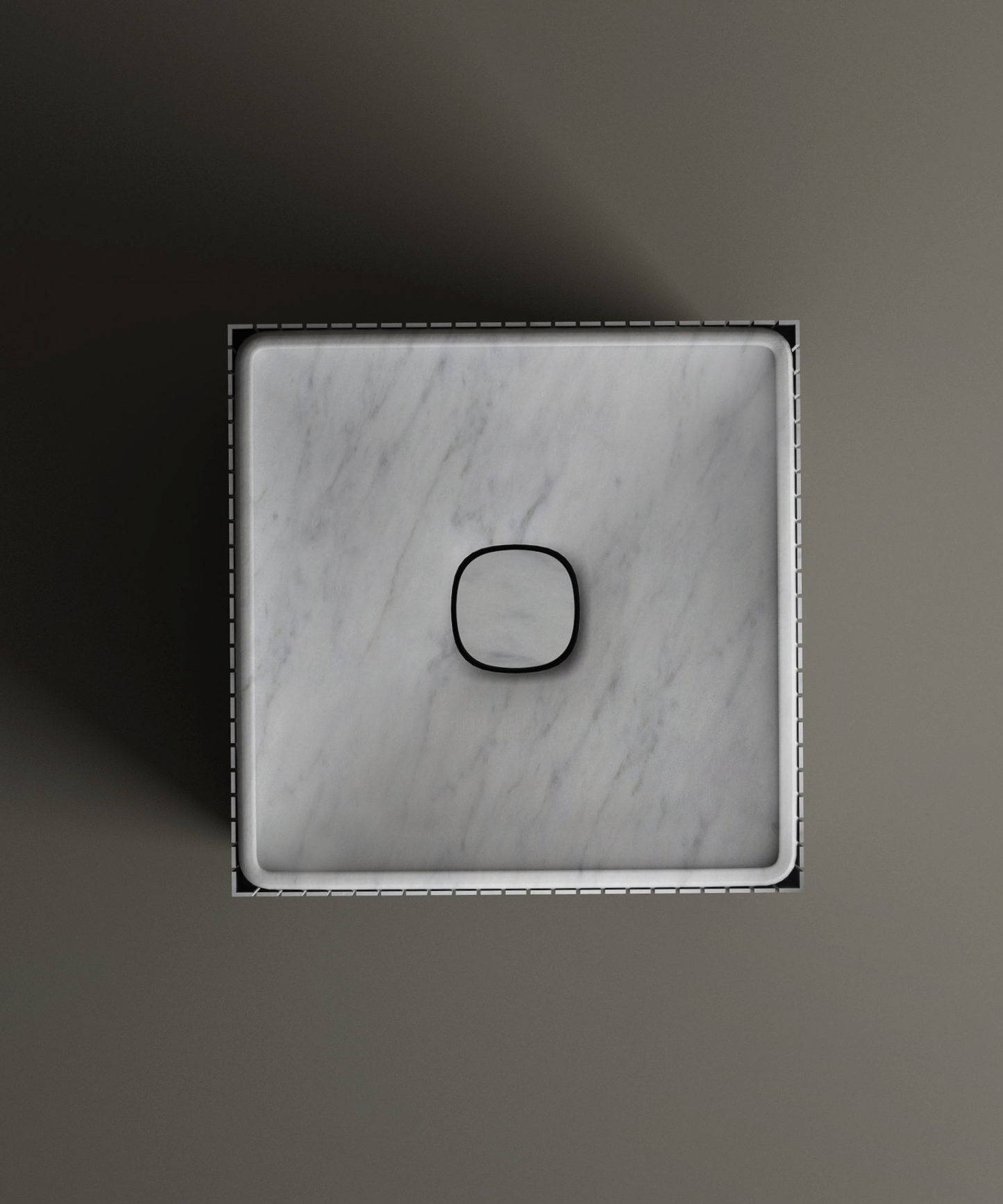 The TRAVERTABLE Carrara Square Fluted Marble Pedestal Vanity Sink, shown from above with white marble and subtle gray veining, features a rounded central drain—ideal for contemporary bathrooms with its smooth, modern design.