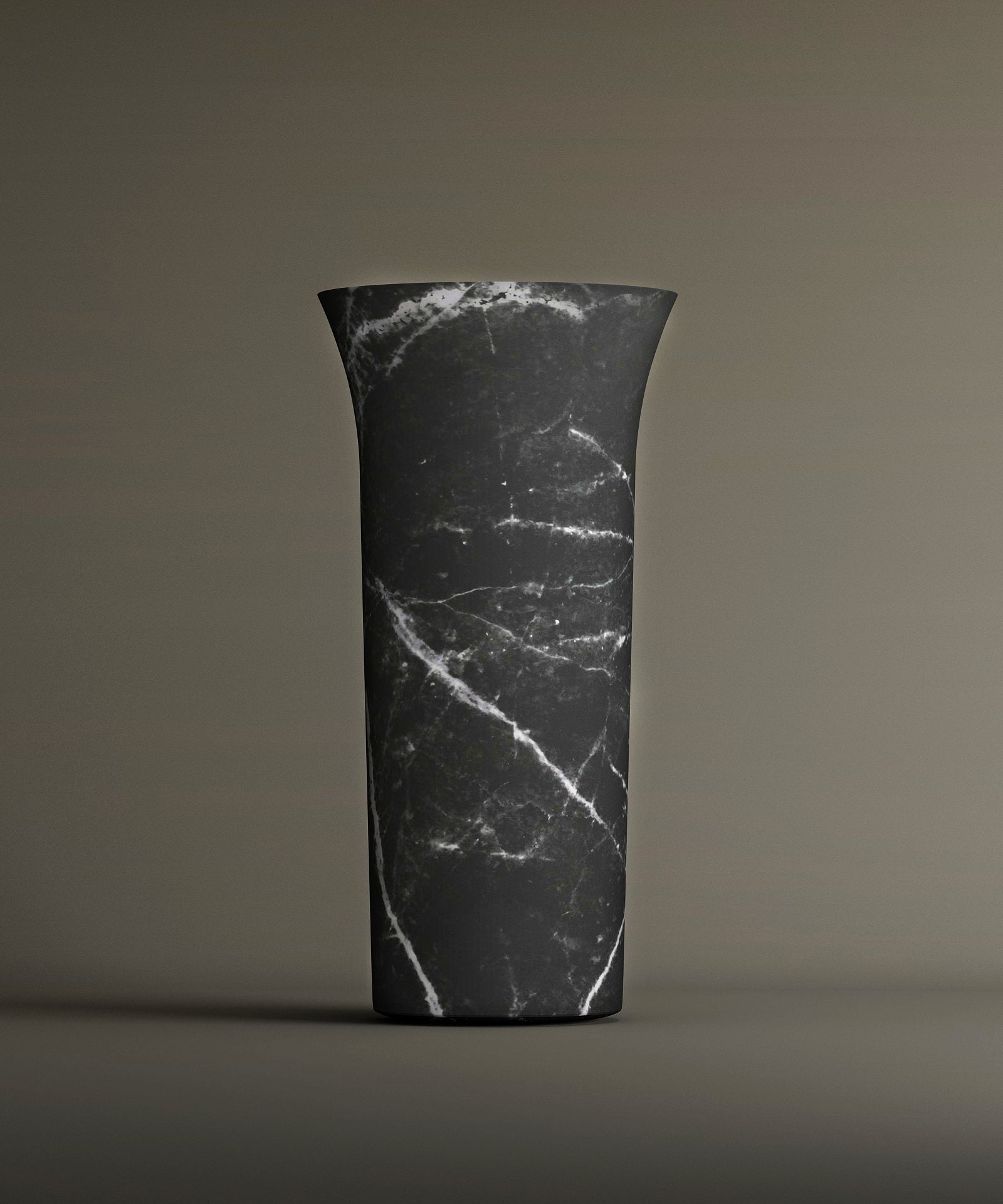 The TRAVERTABLE Nero Marquina Marble Cylinder Pedestal Vanity Sink features dramatic white veining and a flared rim, making it ideal for sculptural impact in design-forward bathrooms.