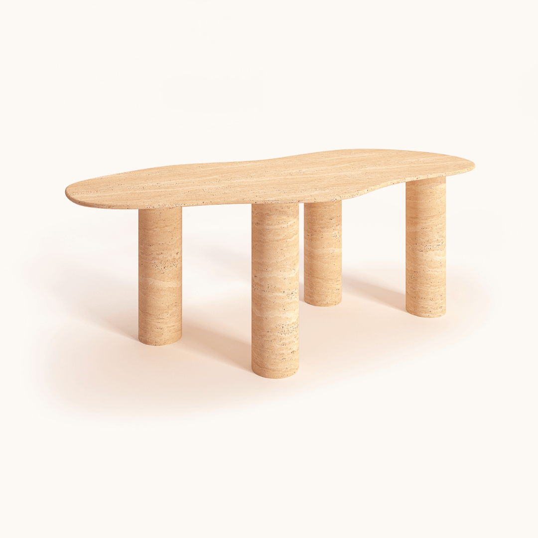 The Cascade Travertine Dining and Meeting Table by Travertable showcases natural elegance with its irregularly shaped top and four cylindrical legs, crafted from light wood. Its customizable, making it perfect for those who value refined simplicity against a plain white backdrop.