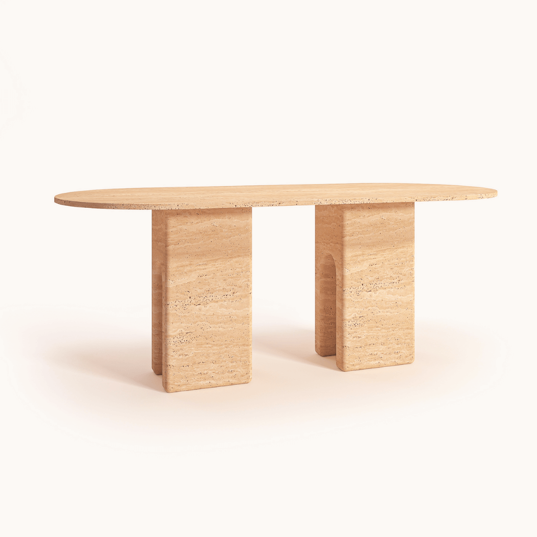 The Regal Arch Travertine Dining and Meeting Table by Travertable is a modern oval table, crafted from light wood with a smooth finish, featuring a customizable tabletop on two block legs that blend sturdiness with minimalist elegance against a plain white backdrop.