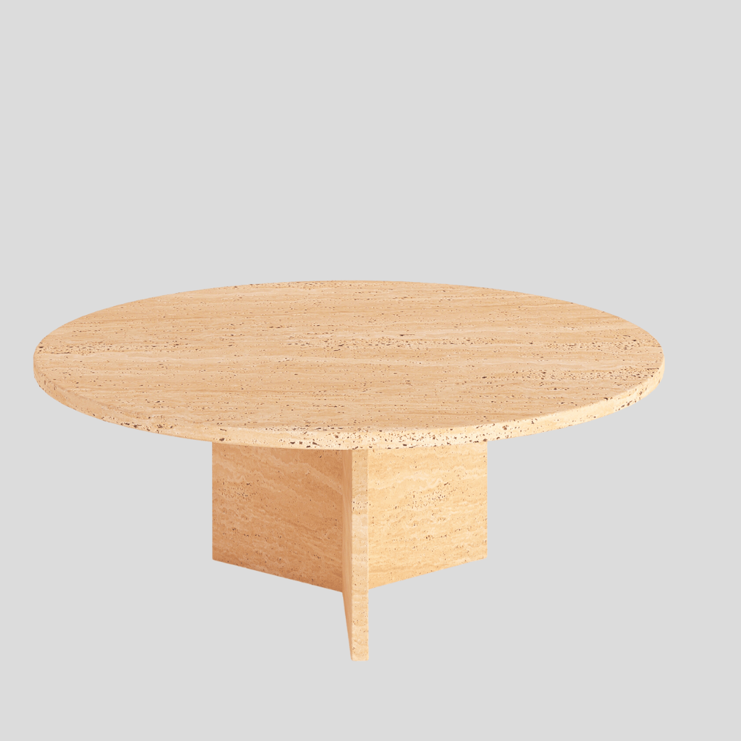 The Cavern Charm Travertine Coffee Table by Travertable, a round stone piece with vintage-inspired design and square base, exudes a luxurious vibe. Set against a light gray background, its timeless simplicity appeals with its raw, earthy charm.