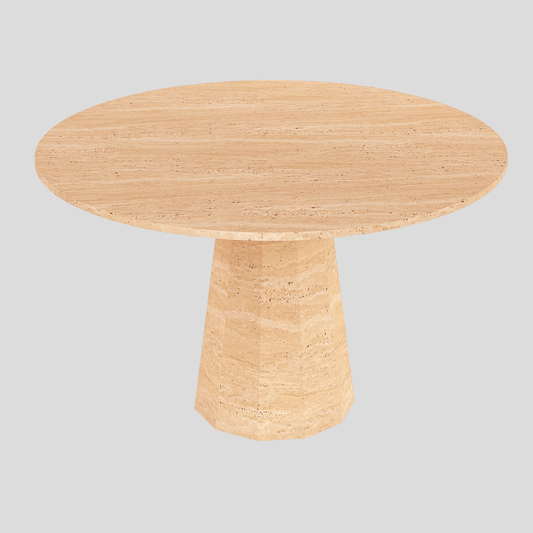 The Apex Round Travertine Dining Table by Travertable features a smooth surface and cylindrical base, set against a plain gray background.