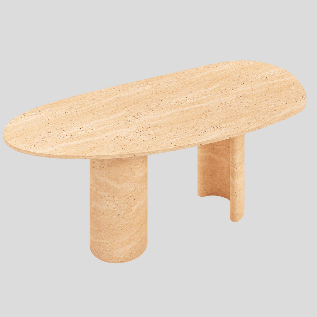 The Zenith Travertine Dining Table by Travertable is a large, oval-shaped wooden table with a light wood finish. It features customizable options and distinctive cylindrical pedestal bases—one solid, the other partially open—akin to its namesake design. The backdrop is plain and neutral.