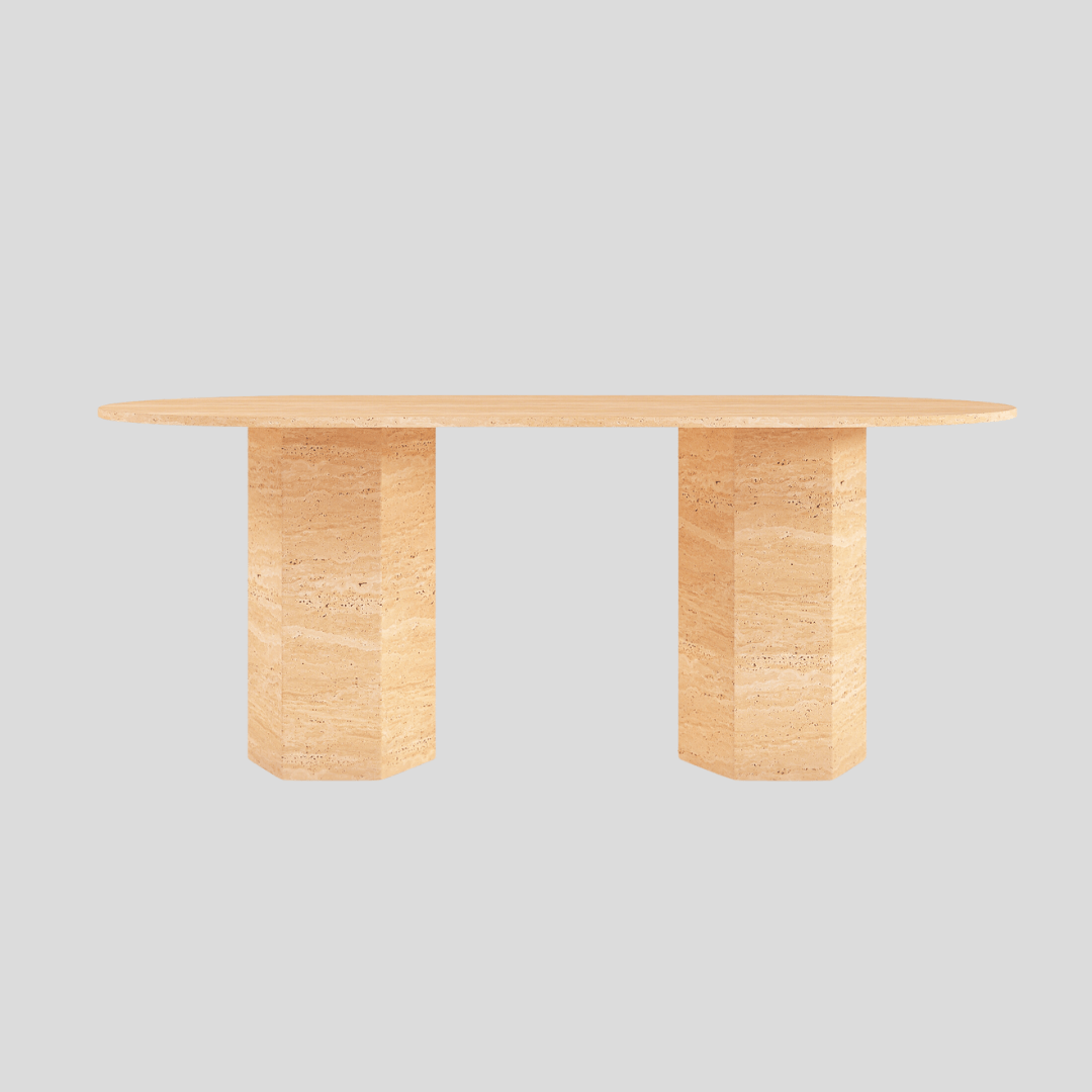 The Hexaform Travertine Dining Table by Travertable is a large rectangular table with a smooth surface and two solid pedestal legs. The tan, speckled texture against a light gray background provides an elegant and customizable tabletop for any refined setting.