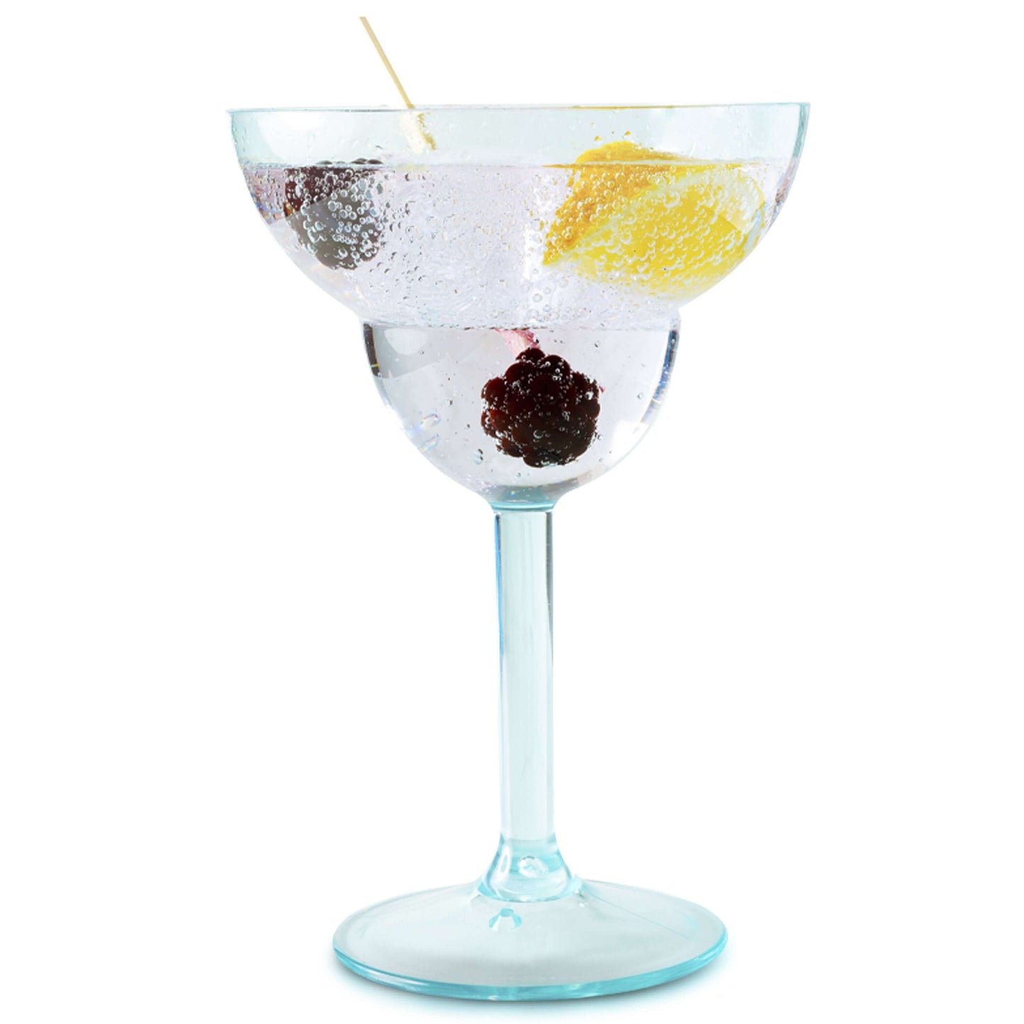 A glass of sparkling water with lemon slices and dark berries, garnished with a toothpick skewer of lemon and berries, in a Mamaco Home 14oz Unbreakable Margarita Glass, made from crystal-clear polycarbonate.