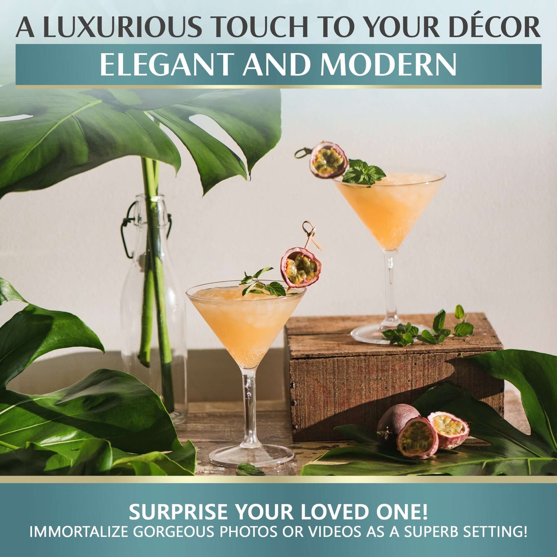 Mamaco Homes Large Martini Glasses, crafted from unbreakable polycarbonate, hold a peach drink garnished with passion fruit and mint. Surrounded by sprigs and leaves, this BPA-free setting is perfect for capturing photos or videos to surprise loved ones against luxurious decor.
