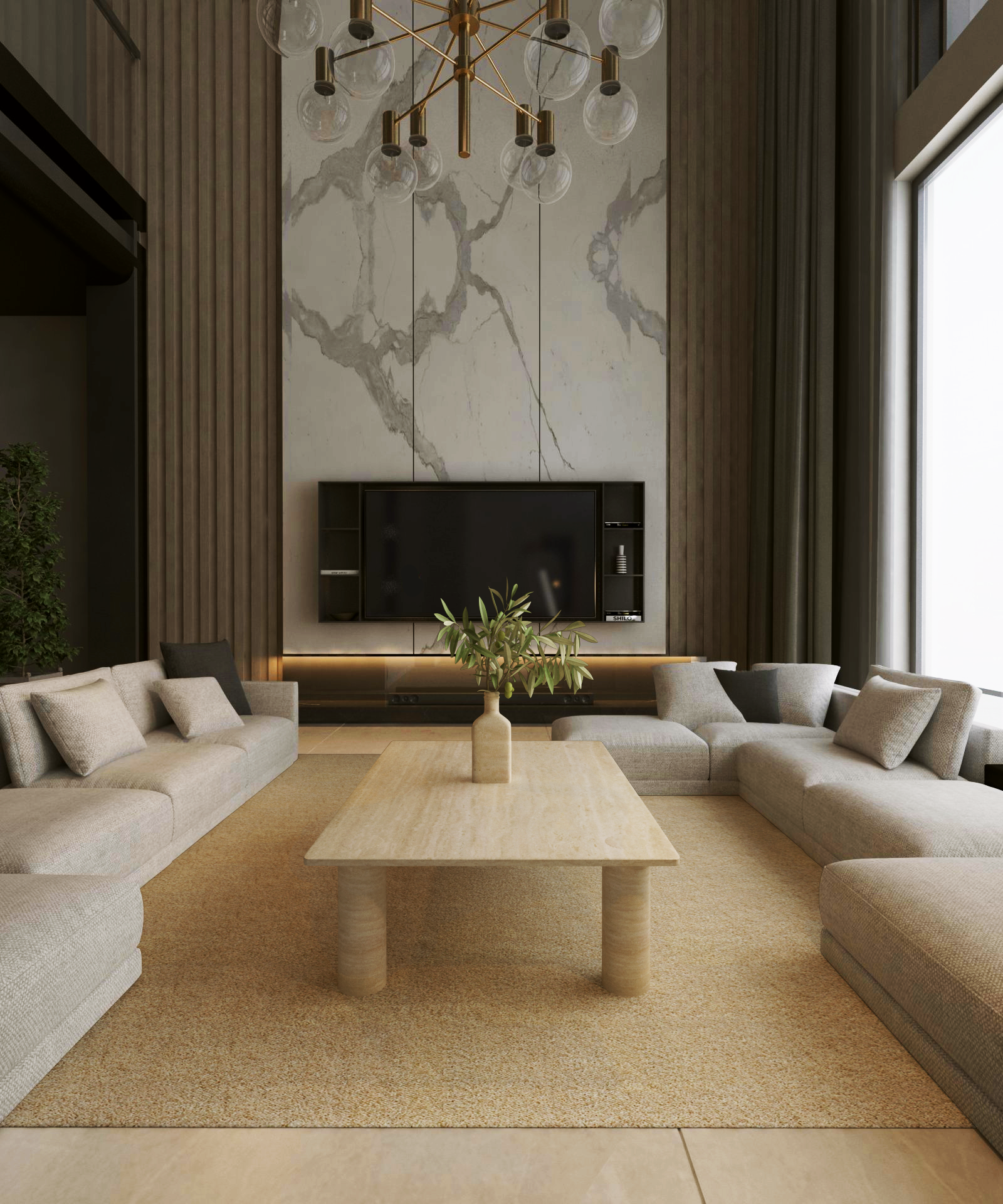 A modern living room with beige sofas around the TRAVERTABLE Rectangular Travertine Coffee Table with Solid Cylindrical Base, a tall marble accent wall, wall-mounted TV, minimal decor, and a large window filling the space with natural light.