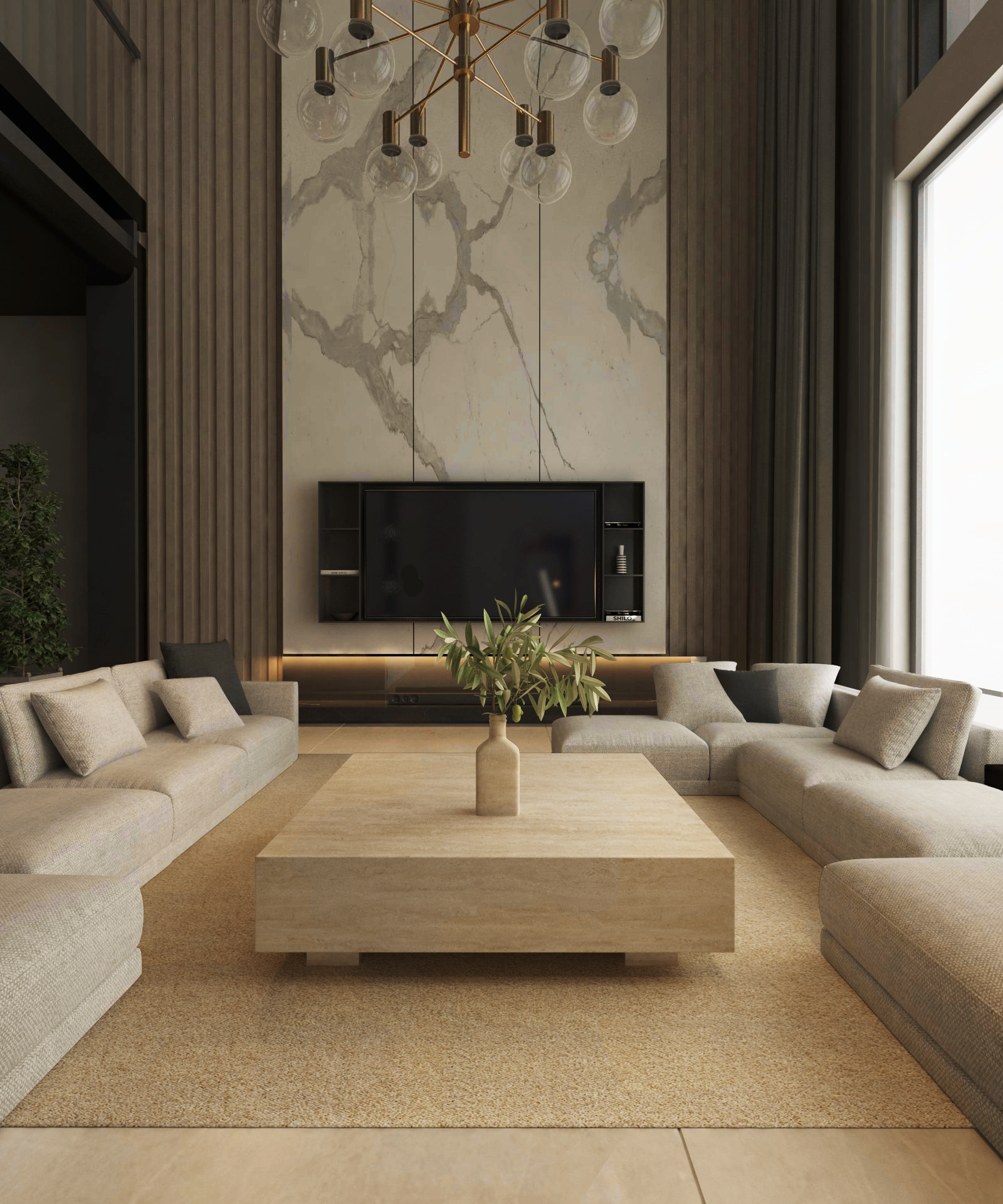 Modern living room with neutral tones, showcasing two large beige sectionals facing the TRAVERTABLE Square Travertine Coffee Table with Hidden Base. A wall-mounted TV sits above a floating console on a marble accent wall, brightened by tall windows.