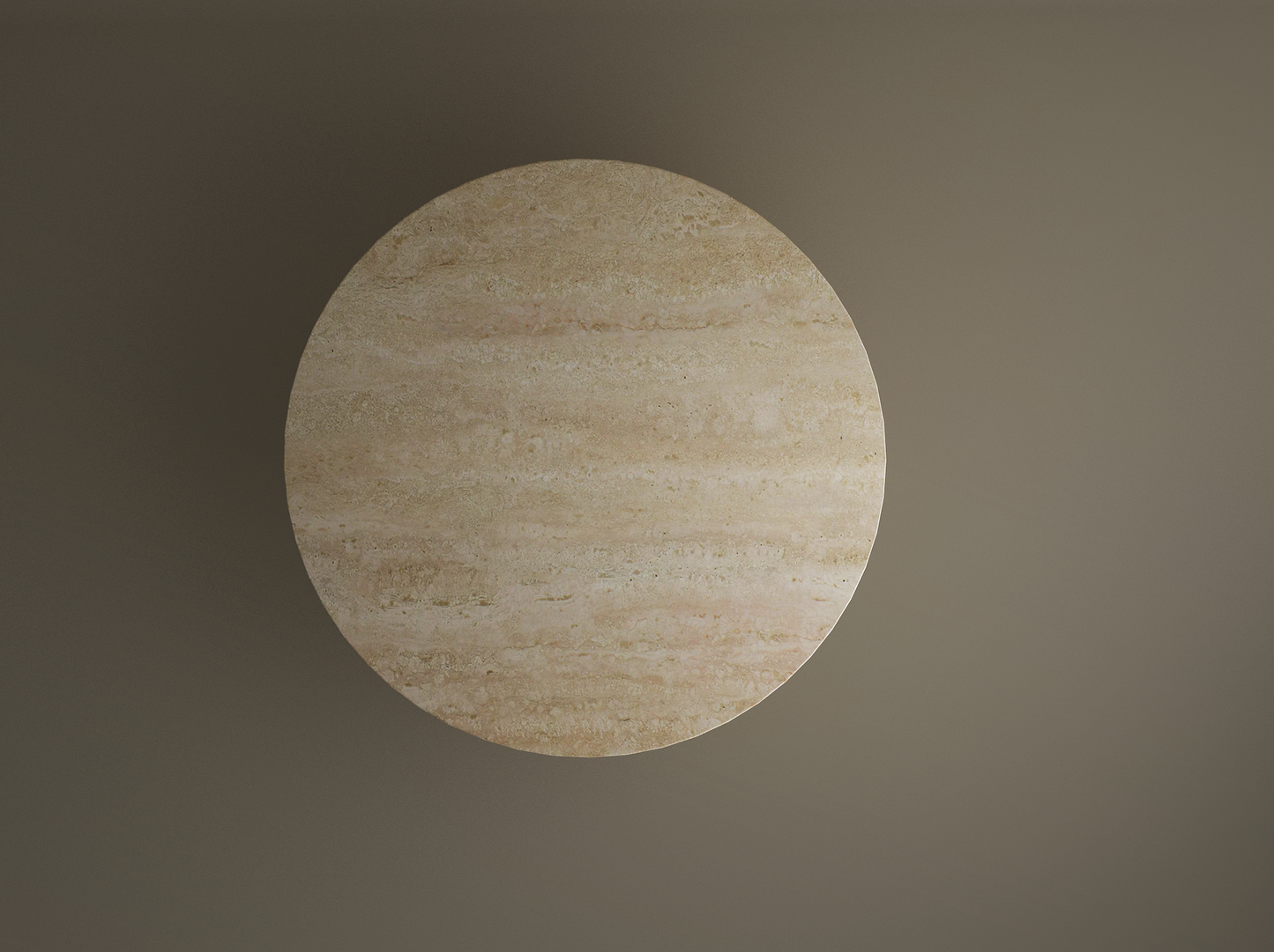 An oval travertine dining table by TRAVERTABLE, crafted from pure travertine stone with a cylindrical center base, is seen from above on a plain background. The natural marbled surface and color variations add elegance to any dining space.