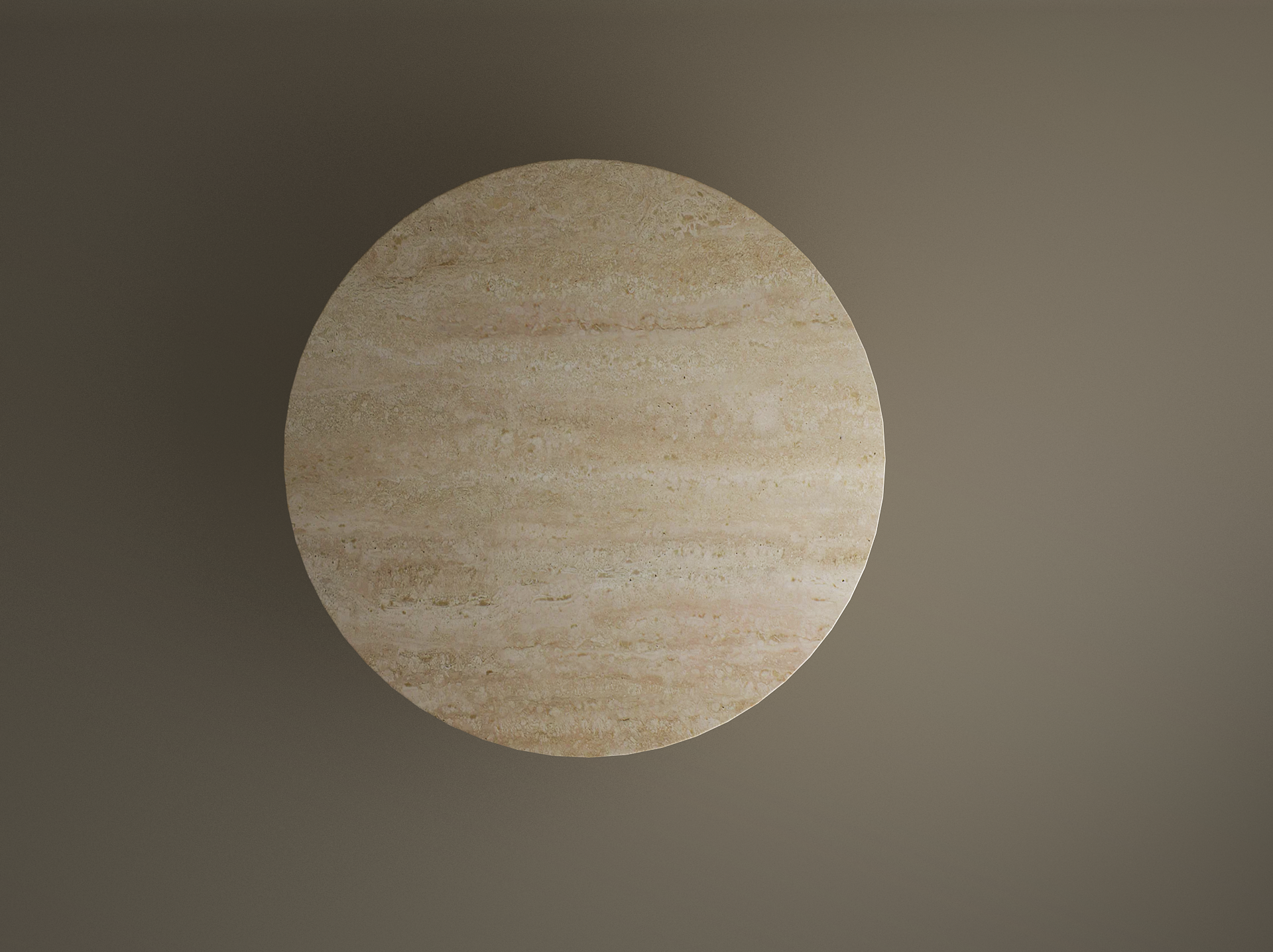 An oval travertine dining table by TRAVERTABLE, crafted from pure travertine stone with a cylindrical center base, is seen from above on a plain background. The natural marbled surface and color variations add elegance to any dining space.