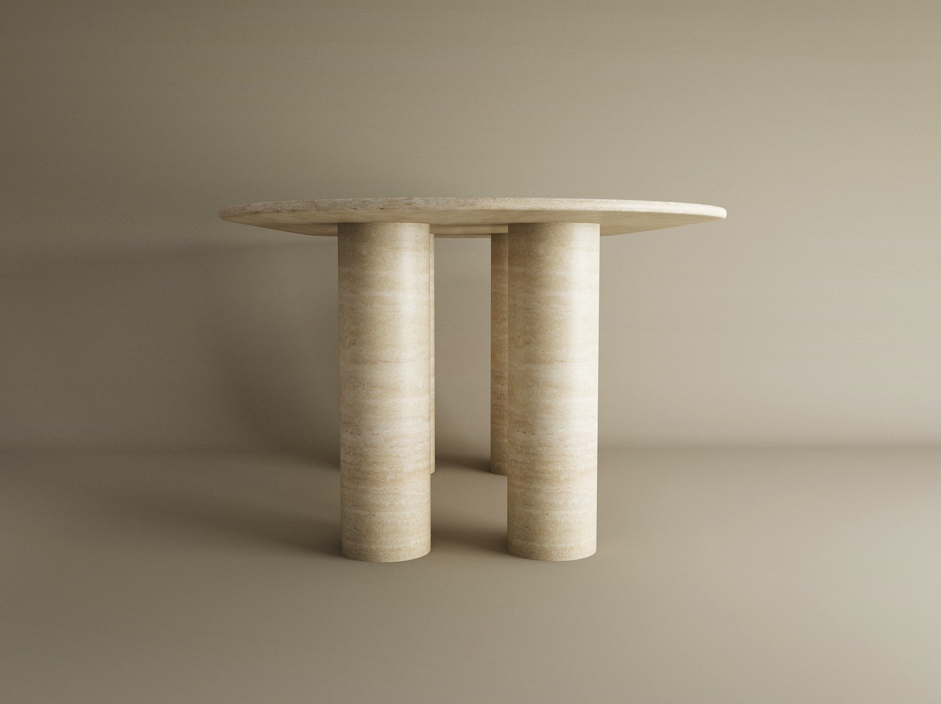The TRAVERTABLE Oval Travertine Dining Table features a pure travertine stone tabletop and sturdy cylindrical base, offering customizable options and heirloom quality for timeless appeal against a neutral backdrop.