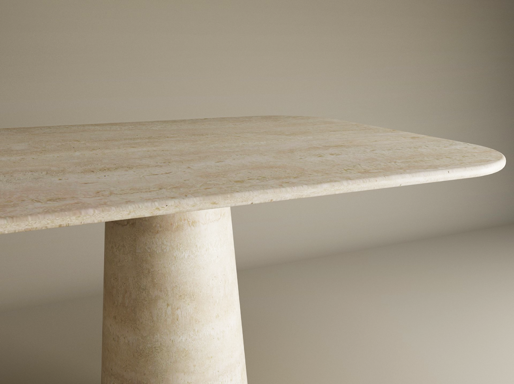 The TRAVERTABLE Rectangular Travertine Dining Table features a natural stone tabletop with rounded corners and a conical organic travertine stone base, shown against a plain, light background. Customizable options available.