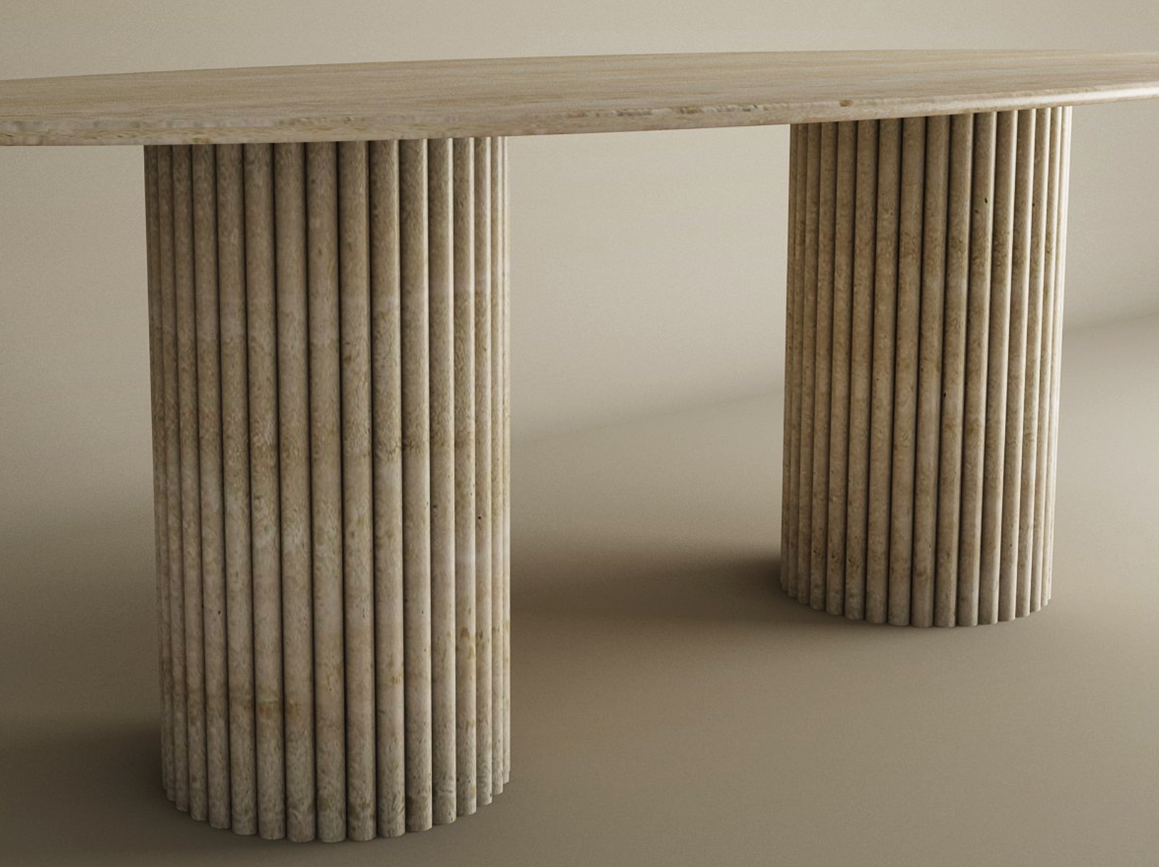 The TRAVERTABLE Ellips Travertine Dining Table features a smooth natural stone top and two vertical groove bases—an heirloom, customizable piece that adds refined elegance to any space.