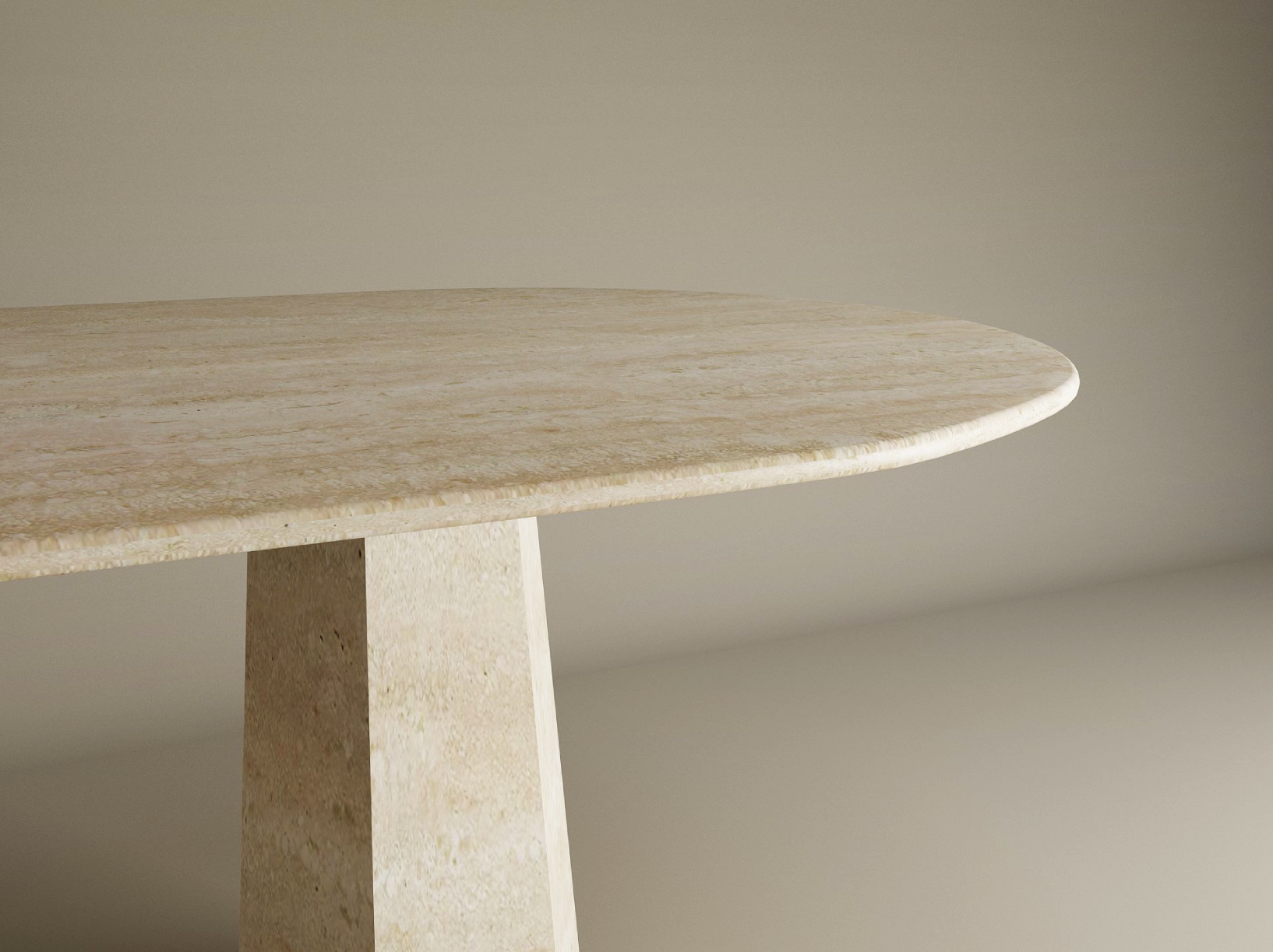 The TRAVERTABLE Oval Travertine Dining Table features a smooth, oval top and a solid tapered round travertine stone base. This minimalist, customizable piece adds elegance to any space with its light beige finish and sleek design.