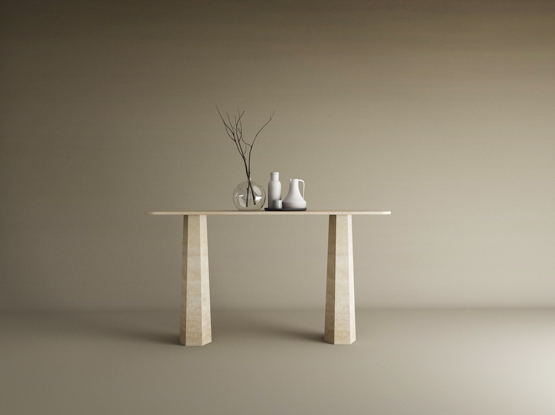 The TRAVERTABLE Rectangular Travertine Console Table with a solid, tapered round base displays a glass vase and ceramic vessels in minimalist beige, set against a plain background. This customizable piece offers contemporary elegance.