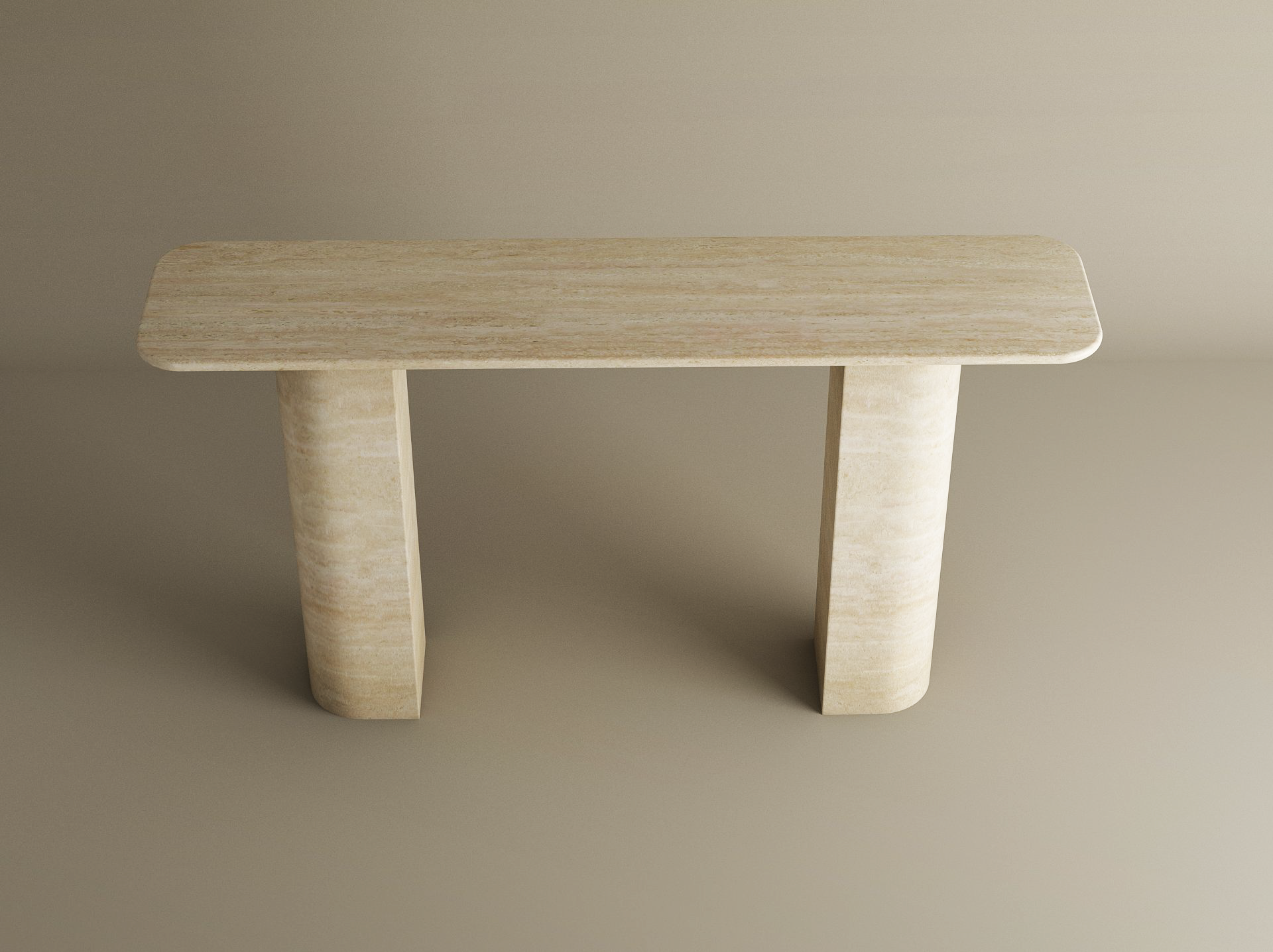 The TRAVERTABLE Rectangular Travertine Console Table features a customizable natural stone top and a sloped pedestal base, offering a minimalist sculptural design perfect against a plain beige background.
