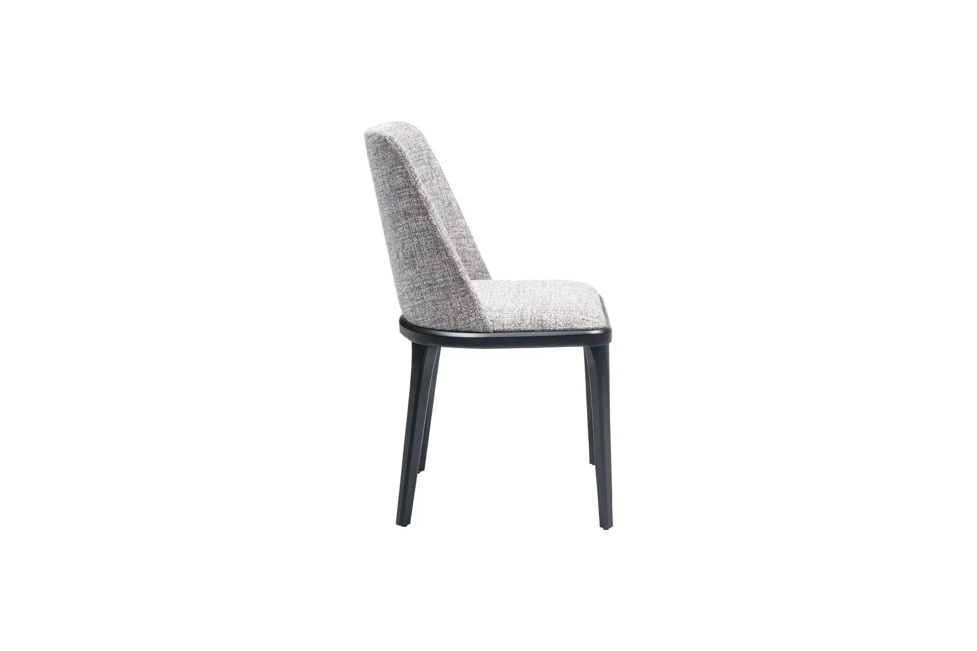 Side view of the Travertable Comfort Dining Chair, featuring a gray fabric seat and backrest with black metal legs. This chair showcases a minimalist, modern design and an ergonomic structure for maximum comfort.