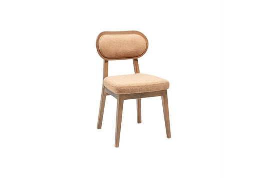 Introducing the Travertable Modern Comfort Dining Chair—its sleek wooden frame supports a textured fabric seat and backrest. The chairs gentle curves and clean lines create minimalist elegance against a plain white background, embodying contemporary design at its finest.