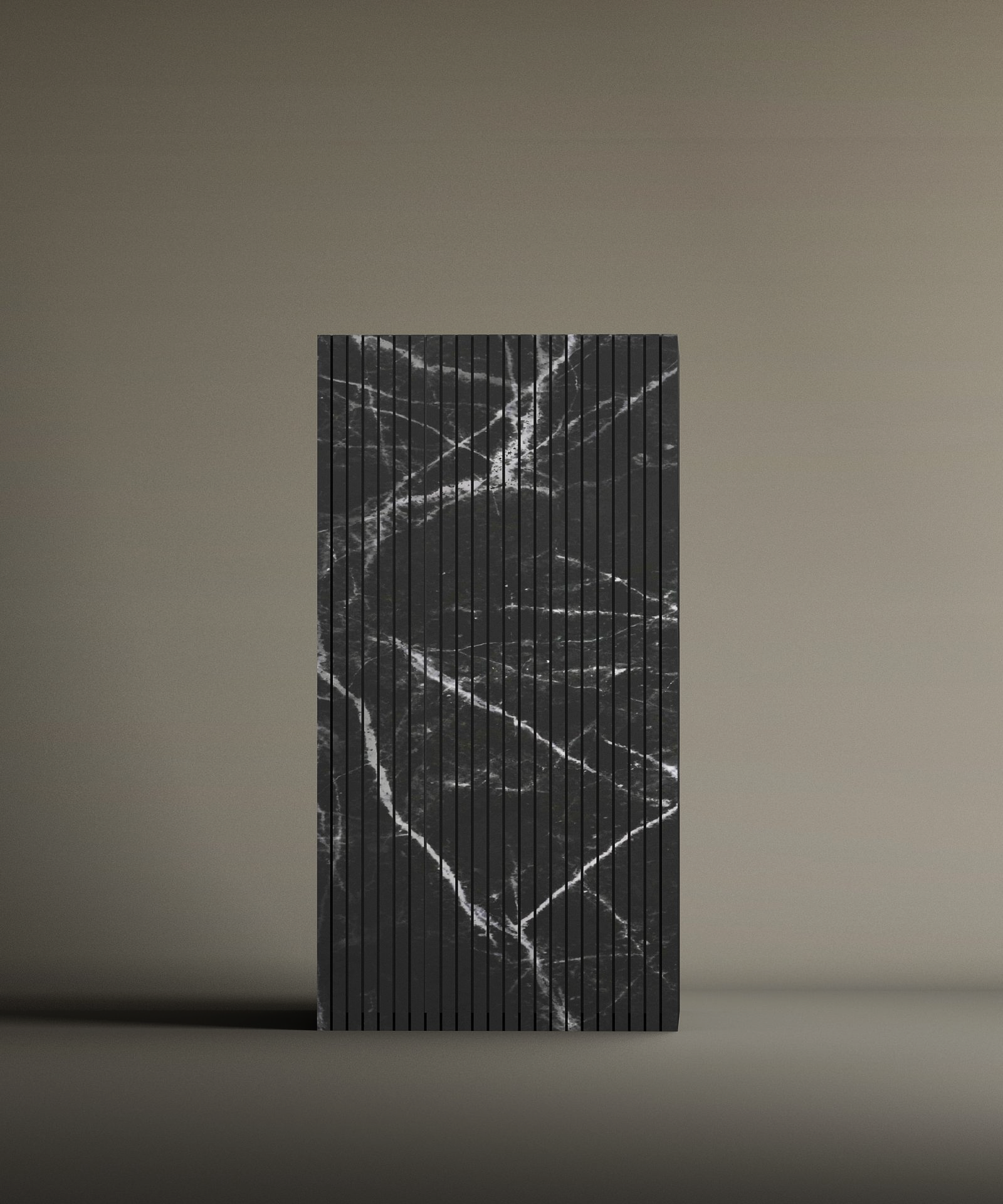 The TRAVERTABLE Nero Marquina Square Fluted Marble Pedestal Vanity Sink is a rectangular, upright sink with vertical grooves and a black surface featuring irregular white marble-like veins, set against a plain beige background.